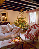 Country style cottage sitting room decorated for Christmas