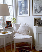Corner of sitting room with Gustavian armchair in Mjolby, Sweden