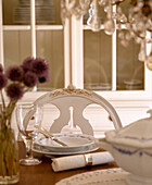 Dining room detail with Gustavian chair and place setting in Mjolby, Sweden