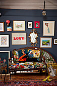 Upcycled vintage sofa and picture wall in Brighton home East Sussex, UK