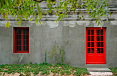 Exterior of building with bright red paintwork