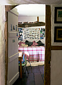 View through doorframe to child's bedroom in 17th Century Oxfordshire home