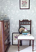 Antique chair with wooden chest of drawers in Oxfordshire home, England, UK