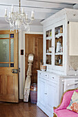 Frosted glass door with glass-fronted cabinet in Whitley Bay cottage Tyne and Wear England UK