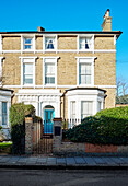 Front gate of semi-detached Victorian house South East London, UK