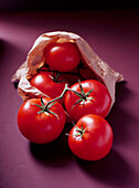 Paper bag of vine tomatoes