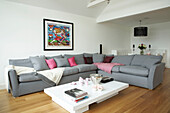 Open plan living room with L shaped sofa