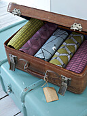 Vintage suitcase with fabric samples in Winchester, Hampshire, UK