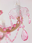 Detail of a pink glass chandelier