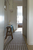 hallway with carpet runner