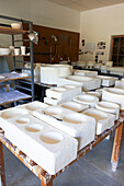 Ceramic moulds on table in work studio, Austerlitz, Columbia County, New York, United States