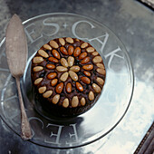 Fruit and nut cake on a glass cake stand