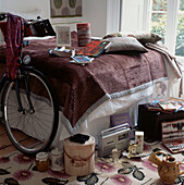 Grandparents bedroom full of opened Christmas presents displayed on the bed