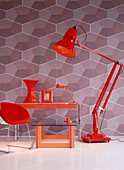 Retro wallpapered room with red furniture home wares and lighting