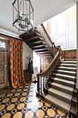 Silver lantern in tiled hallway of Georgian Grade II listed Surrey home UK