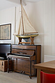 Model boat on piano in Isle of Wight holiday home