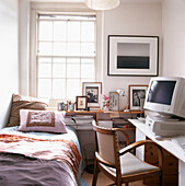 Study area and spare bedroom with computer desk and chair
