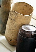 Close up of African clay and wooden pots