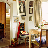 Corner of cottage living room and stairwell