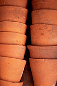 Stack of terracotta plant pots