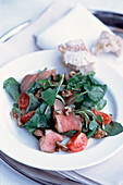 Smoked duck salad with walnuts watercress and mustard dressing
