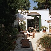 Patio with sunshade and chairs