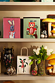 Shelf detail with vases and Tulips and toadstools