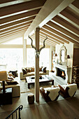 Elevated view of beamed living room in luxury Zermatt home, Switzerland