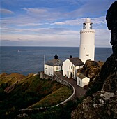 Lighthouse on sea cliff