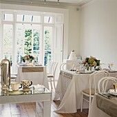 Tearoom with windows opening to summer balcony