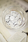 Badges and label in seamstress' studio,  Faversham home,  Kent,  UK