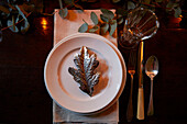 Silver leaf on place setting  Rochester  Kent  UK