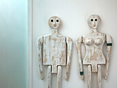 Carved wooden statues in bathroom of Essex home UK