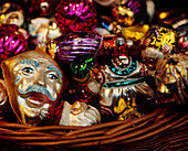 Woven basket of brightly coloured decorations