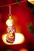 Hanging angel bauble decorations on display at a Christmas market in Krakow