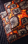 African textile covering on cushions
