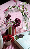 Flowers and book on table