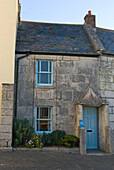 Facade of stone cottage in Portland Dorset UK 