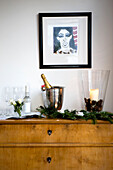 Sideboard decorated in Christmas ornaments