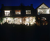Luxury house exterior illuminated at night