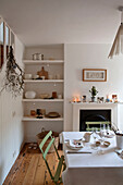 Recessed shelving in Richmond home with original fireplace