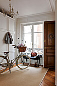 Bicycle in hallway of Paris apartment, France