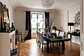 Dining table in Paris apartment with parquet flooring at Christmas, France