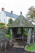 Garden pavilion and rural farmhouse exterior in Blagdon, Somerset, England, UK
