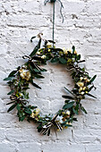 Daffodil (Narcissus) wreath tied with black and cream bows London England UK
