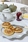 Crumpets and jam on Marazion beach house table Cornwall UK