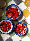 Three bowls of sliced strawberries Morocco North Africa