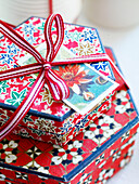 Decorative red gift boxes tied with ribbon