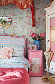 Contrasting florals with upcycled furniture in Tenterden bedroom Kent UK