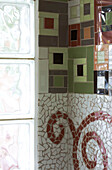 Contrasting tiled patterns and glass bricks in Cambridgeshire home UK
